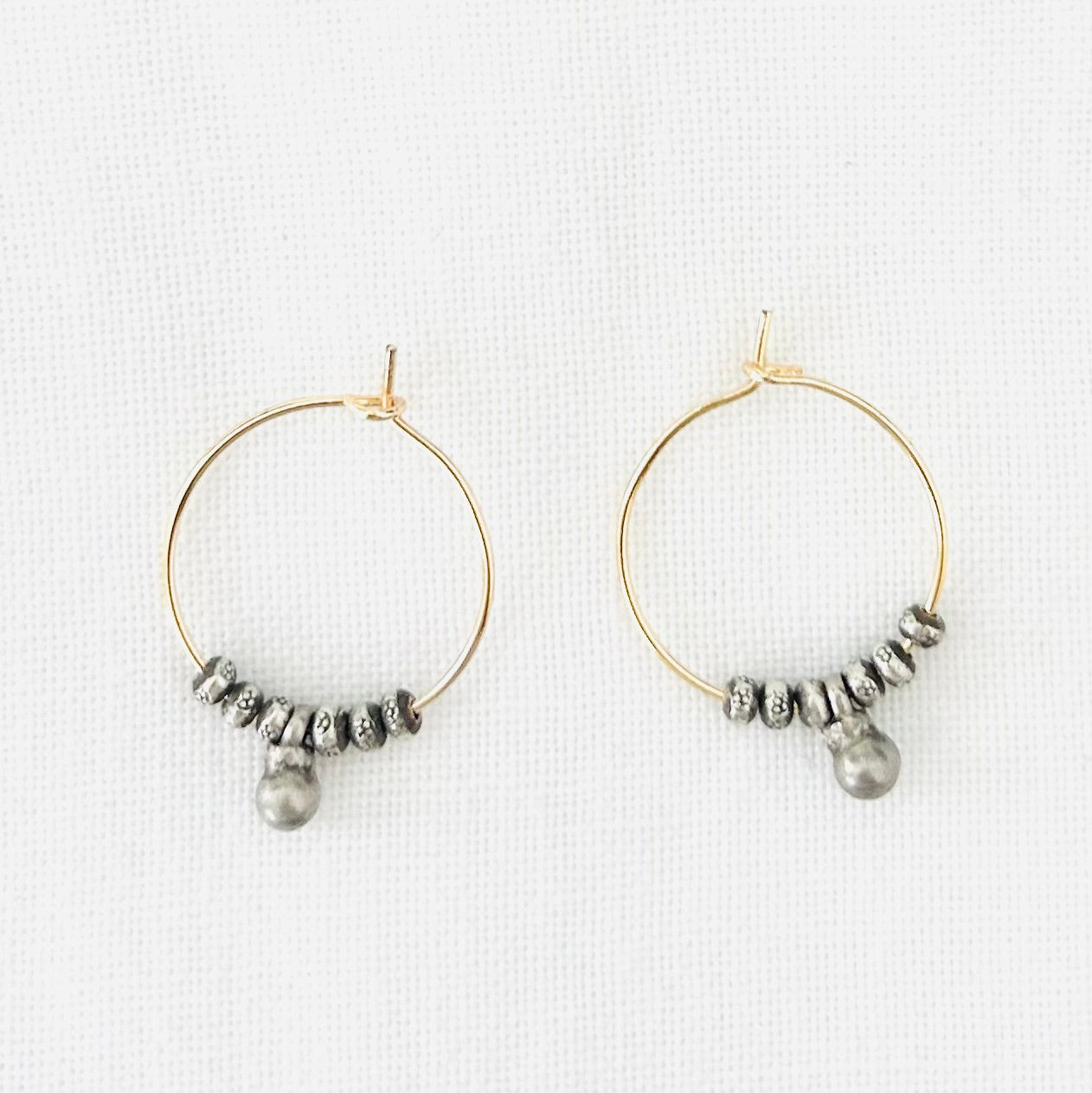 Hoops with silver beads and antique charms